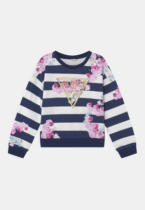 Sweat-shirt à manches longues rayé bleu marine et blanc avec des accents floraux roses et un logo Guess bordé d'or sur le devant.