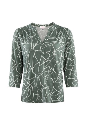 Grünes 3/4-Ärmel-Oberteil mit V-Ausschnitt, das mit einem weißen Blumenmuster und drei Knöpfen am Hals ausgestattet ist. Hergestellt aus weichem, strukturiertem Stoff.