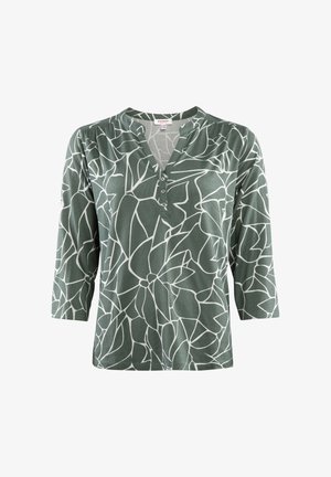 Grünes 3/4-Ärmel-Oberteil mit V-Ausschnitt, das mit einem weißen Blumenmuster und drei Knöpfen am Hals ausgestattet ist. Hergestellt aus weichem, strukturiertem Stoff.