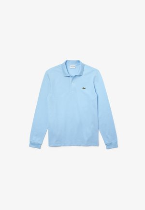 Polo shirt a maniche lunghe blu chiaro con colletto, caratterizzato da un logo Lacoste verde nella zona sinistra del petto. Realizzato in morbido cotone.