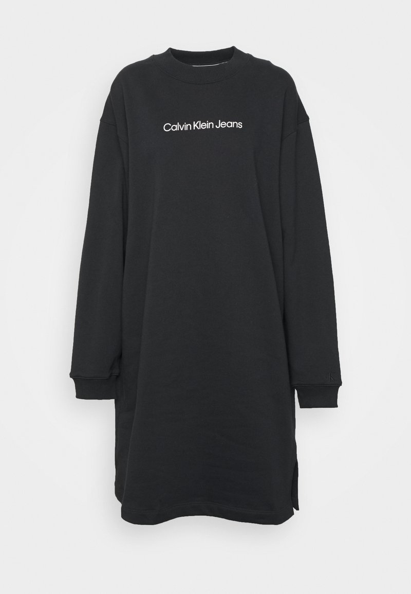 Robe décontractée noire à manches longues avec poignets et encolure côtelés, comportant le texte blanc "Calvin Klein Jeans" sur la poitrine.