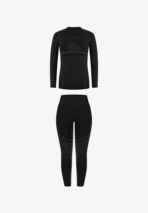 Black activewear set featuring a long-sleeve top and fitted leggings. Textured fabric with reflective accents and ergonomic seams for comfort.