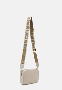 Coccinelle TEBE - Soma ar siksnu pāri ķermenim - beige