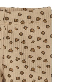 Rippierte beige Leggings mit einem Leopardenmuster in Braun- und dunkleren Tönen, ausgestattet mit einem elastischen Bund für zusätzlichen Komfort.