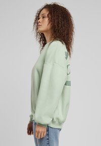 Karl Kani Sweatshirt - light mint