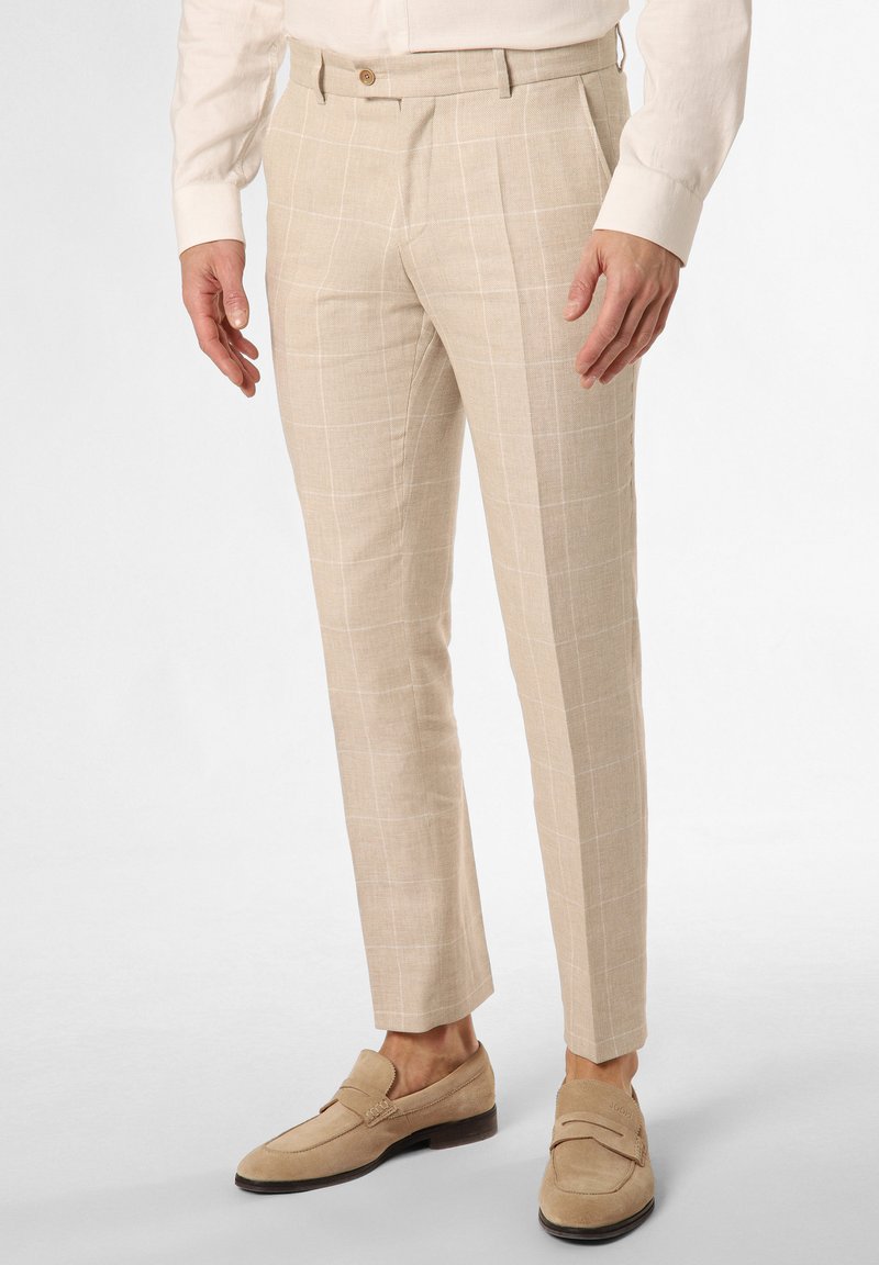 Beige plaid trousers made of lightweight fabric, featuring a tailored fit, side pockets, and a button closure. Worn with beige loafers.
