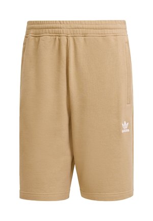 Katoenen tan shorts met een elastische tailleband, zijzakken en een wit Adidas-logo op de onderrand. Eenvoudig ontwerp en een gladde textuur.