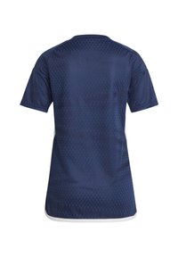 Maglia sportiva blu navy realizzata in tessuto traspirante, caratterizzata da un motivo a diamante testurizzato e maniche corte. Bordo bianco a contrasto sull'orlo.