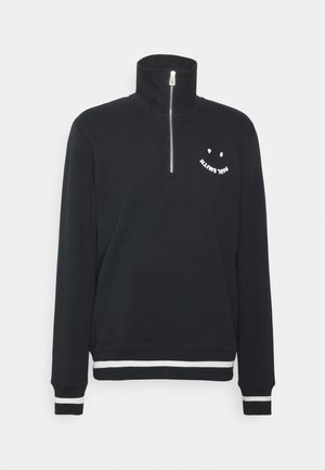 Sort pullover med halv lynlås, høj krave, hvid smiley-grafik og teksten "PAUL SMITH" på brystet samt manchetter og kant med hvide striber.