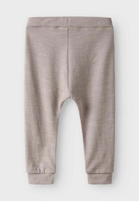 Mjuka beige byxor för småbarn med elastisk midja och vrist cuffs, tillverkade av lätt stickat material.