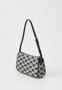 Black and grey canvas handbag with repeating ‘MK’ logo pattern, rectangular shape, single shoulder strap, and silver zipper closure.