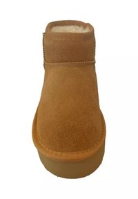 Stivale alla caviglia in suede beige con punta rotonda, morbida fodera in pelliccia e suola in gomma piatta. Presenta cuciture lungo le cuciture per un tocco di dettaglio in più.