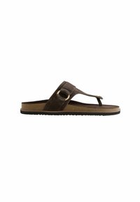 Sandale marron en daim avec une semelle intérieure en liège moulée, une bride ajustable et une semelle en caoutchouc noire.