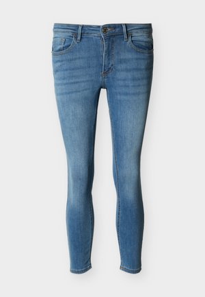 Blå smale denimjeans med knapp- og glidelåslukking foran, forlommer og myntlomme, samt subtile falmingseffekter.