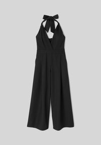 Combinaison noire sans manches à col licou avec jambes larges et fermeture par nouage au cou, présentée sur un fond gris uni.