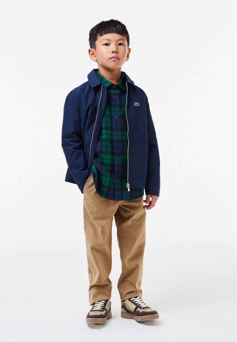 Lacoste Donji dijelovi trenirke - lion
