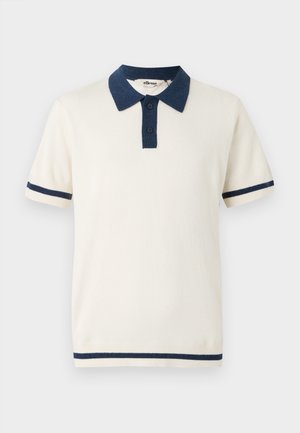 Lühikeste varrukatega polo särk heleses värvitoonis, millel on tumesinine krae ja varruka triibud. Omab kahte nuppu kaeluses ning on pehme ja siledat tekstuuri.