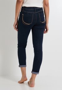 Grain de Malice Vaqueros slim fit - brut