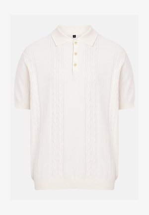 Polo en maille à manches courtes de couleur crème avec motifs en câble et patte de boutonnage trois boutons, taille moyenne indiquée.