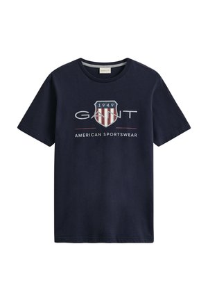 T-shirt blu navy a maniche corte con logo a scudo, "1949" e "GANT American Sportswear" stampati sul davanti.