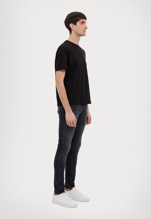 T-shirt con stampa - black