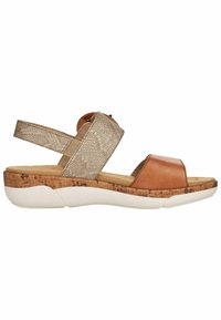 Sandales avec un haut en cuir brun et tissu beige texturé, dotées de détails en liège, d'une semelle blanche et d'une sangle ajustable pour un maintien sécurisé.