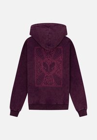 Hoodie in dieppaars. Voorzien van een roze graphic design op de achterkant, met ingewikkelde patronen en texturen. Zacht materiaal, geribbelde manchetten.