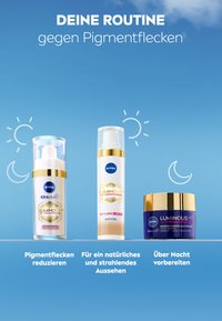 Three NIVEA skincare products displayed against a blue background: a clear bottle with a pump, a beige fluid bottle, and a blue jar with a gold lid.