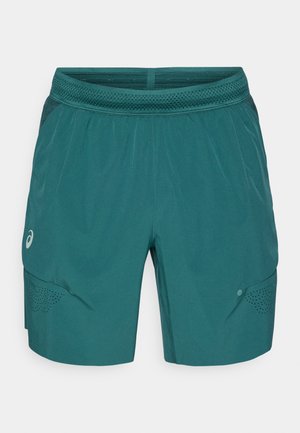 Shorts de sport bleu sarcelle en tissu léger, dotés d'une ceinture en mesh respirant, de poches latérales et d'accents perforés.