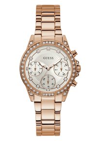 Roségoldene Uhr mit einem Edelstahlarmband, rundem Ziffernblatt, drei Teilzifferblättern und einem mit Kristallen verzierten Lünette um das Ziffernblatt mit Sonnenstrahlenmuster.