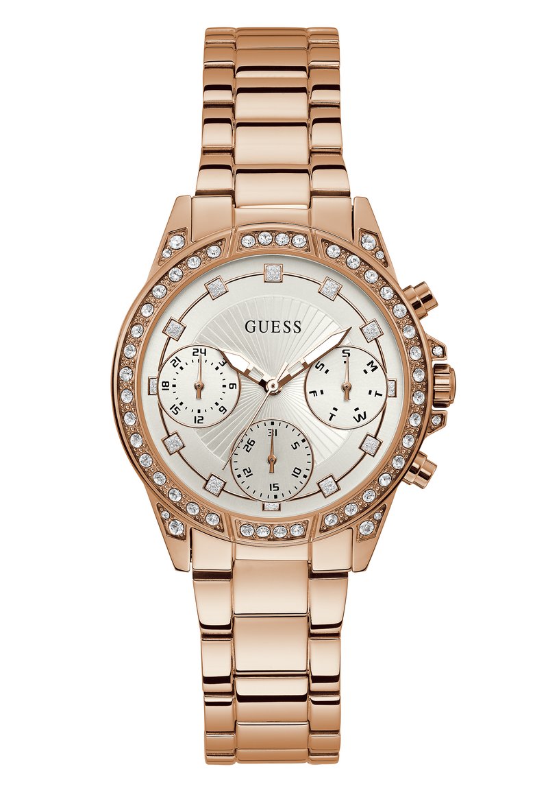 Roségoldene Uhr mit einem Edelstahlarmband, rundem Ziffernblatt, drei Teilzifferblättern und einem mit Kristallen verzierten Lünette um das Ziffernblatt mit Sonnenstrahlenmuster.