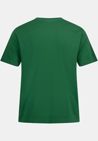 Grønbetrukket bomulds T-shirt med rund hals og korte ærmer. Glat tekstur, afslappet pasform, ingen grafiske designs eller udsmykninger.