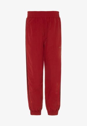 ANOMI - Tracksuit bottoms - dark red