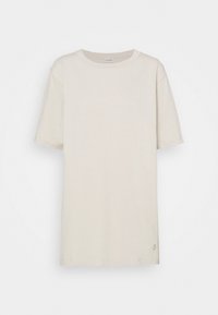 T-shirt beige chiaro a maniche corte realizzato in morbido cotone. Caratterizzato da un collo rotondo e un design minimalista con un piccolo logo dettagliato all'orlo.