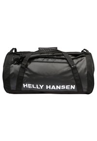 Černá sportovní taška vyrobená z odolného materiálu s dvojicí ramenních popruhů a horní rukojetí. Na boku má bílé logo "Helly Hansen".