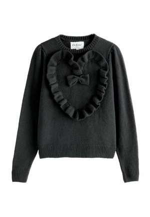 Melns džemperis ar teksturētu adījuma dizainu, sirds formas ruffles detaļu priekšpusē un vidējo lentu akcentu.
