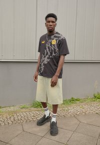 Puma BVB BORUSSIA DORTMUND FTBLCULTURE+ TEE - Sporto klubų atributika - black/shadow gray