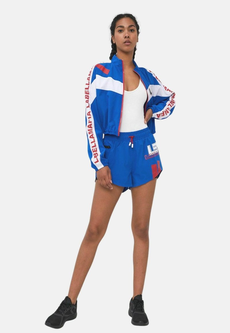 Damen Leichte Jacken | Labellamafia Trainingsjacke blau - BK12751 Damen Leichte Jacken | Labellamafia Trainingsjacke blau - BK12751
