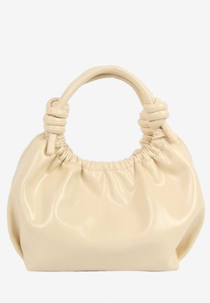 Håndveske i mykt skinn i kremfarge med samlet topp og knyttede doble håndtak på hvit bakgrunn.