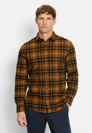 Brown and black plaid shirt with long sleeves, button-up front, and a classic collar. Made of textured fabric with visible stitching.