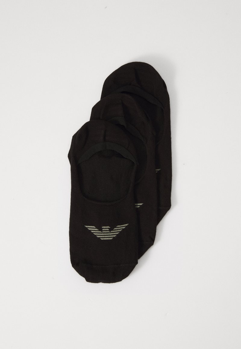 Chaussettes de cheville noires avec une texture lisse, présentant un design de logo avec des rayures vertes. Trois paires empilées, design sans couture en haut.