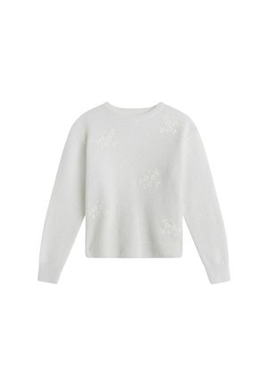 Vit långärmad tröja med diskret blommönster spritt över framsidan och rund halsringning.