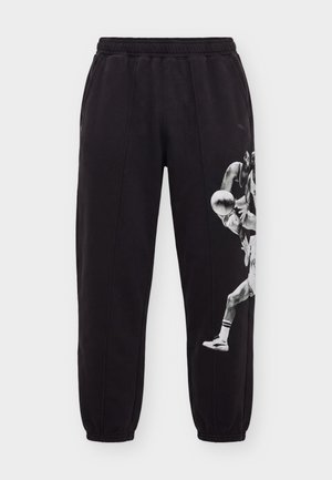 Puma, MEMORY LANE - Pantalon de survêtement - black
