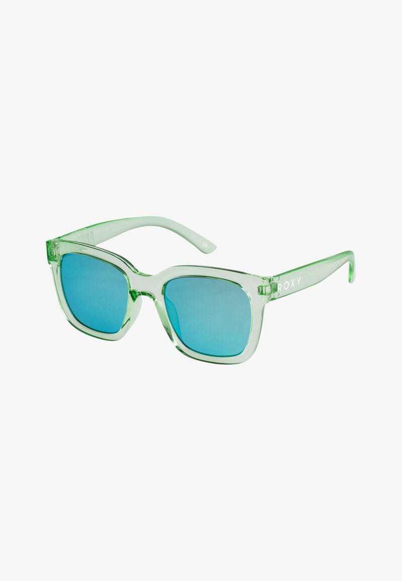 Lunettes de soleil carrées à monture verte transparente avec des verres teintés bleus et le logo "ROXY" sur les branches, sur fond blanc.