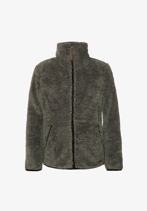 Grijze fleecejas met een hoge kraag, ritssluiting en twee zakken aan de voorkant. Gecombineerd met zwarte skinny jeans en witte sneakers.