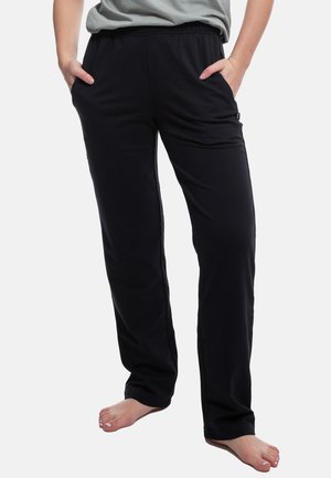 Schwarze, elastische Hosen mit Seitentaschen, aus weichem, dehnbarem Material gefertigt. Lockerer Schnitt mit geradem Bein, geeignet für die Freizeit.