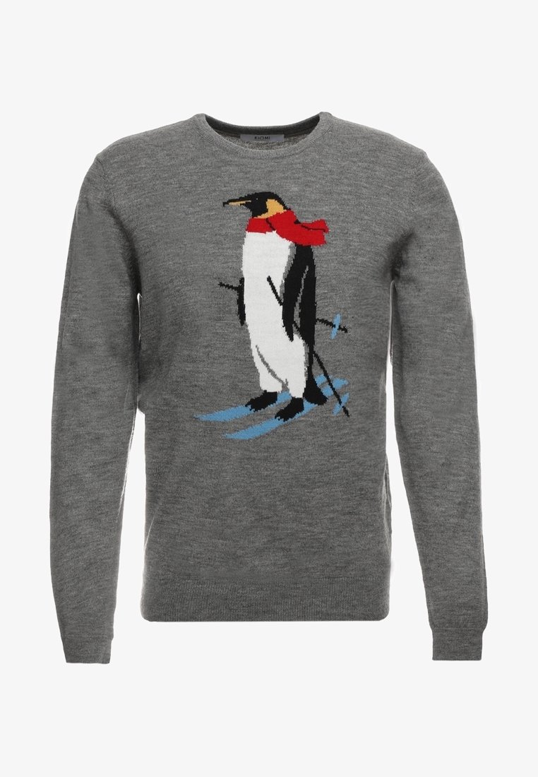 Pull gris avec un pingouin portant une écharpe rouge et des skis, tenant des bâtons de ski à l'avant.