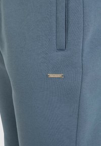 Smilodox CASUAL SPORT FIERO - Trainingsbroek - blau
