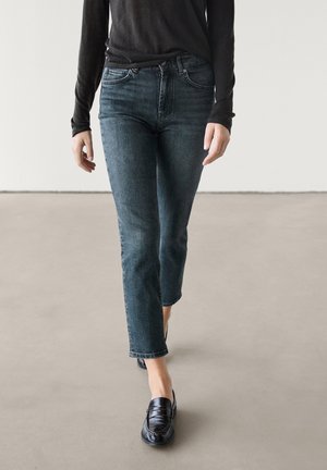 Flared Jeans - mottled blue