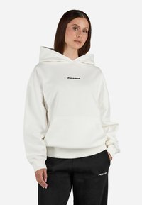 Pegador CLARITA - Felpa - washed warm white/black